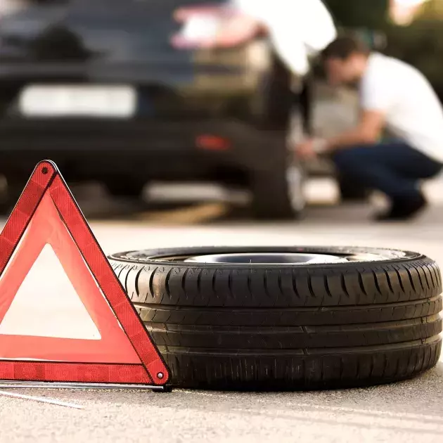 triangle sécurité changer pneu